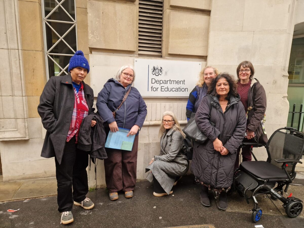 members of Adult Adoptee Movement standing outside the Department for Education